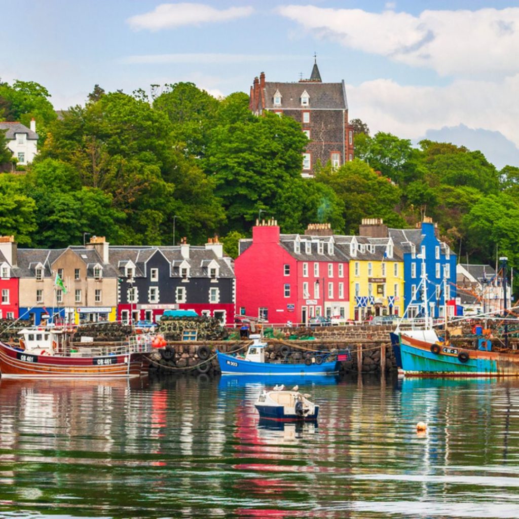 One of the colourful places in the UK. You can see housees with a harbour in front